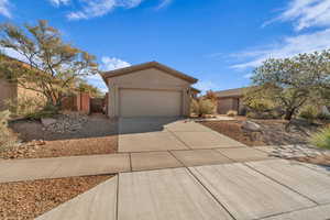 Ranch-style home featuring a garage