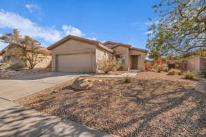 View of front of property with a garage