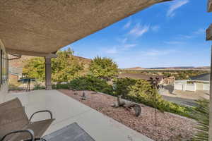 View of patio / terrace with a mountain view