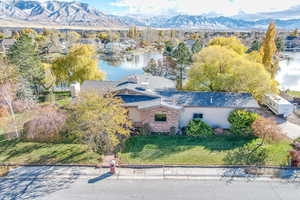 Bird's eye view featuring a water and mountain view