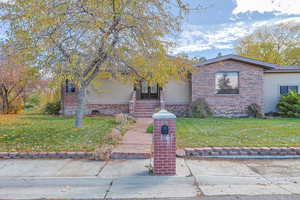 View of front of house with a front lawn