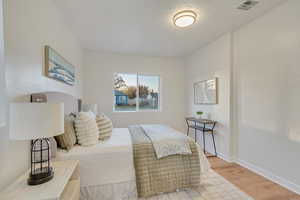 Bedroom with light wood-type flooring