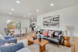 Living room with light wood-type flooring