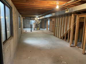 Basement with gas water heater and heating unit