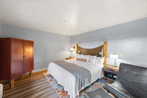 Bedroom featuring hardwood / wood-style floors