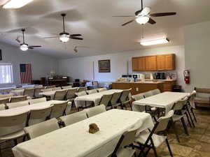 Dining room with vaulted ceiling