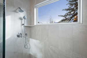 Bathroom with tiled shower