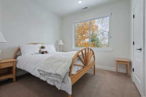 Bedroom with carpet