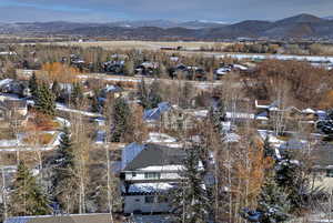 Birds eye view of property featuring a mountain view