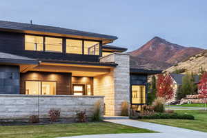 View of front of property with a mountain view