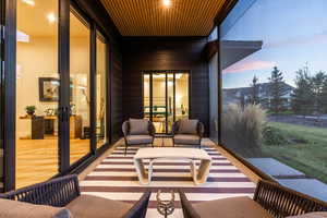 Patio terrace at dusk with french doors