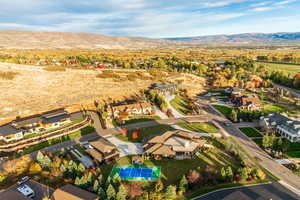 Birds eye view of property featuring a mountain view