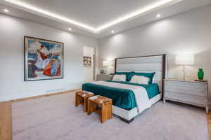 Bedroom with light hardwood / wood-style flooring