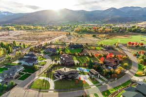 Birds eye view of property with a mountain view