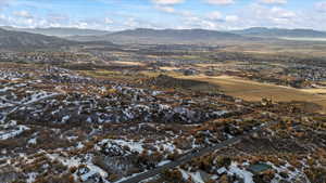 Snowy aerial view with a mountain view