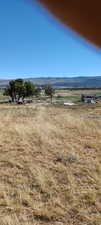 Property view of mountains featuring a rural view