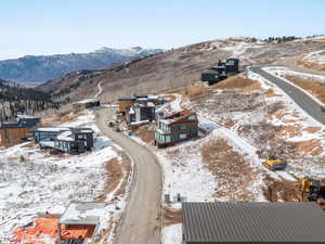 Snowy aerial view with a mountain view