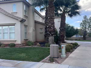 View of home's exterior with a lawn