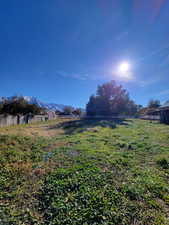 View of yard featuring a mountain view and a rural view