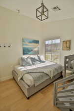 Bedroom featuring light hardwood / wood-style flooring