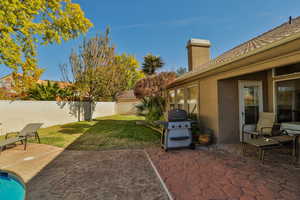 View of yard with a patio area