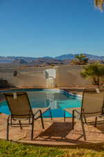 View of pool featuring a mountain view