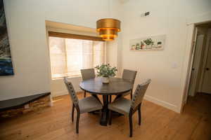 Dining space featuring light wood-type flooring