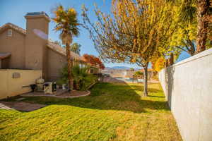 View of yard with a mountain view and a patio