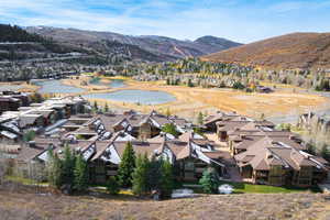 Bird's eye view featuring a water and mountain view