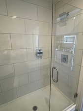 Bathroom featuring walk in shower