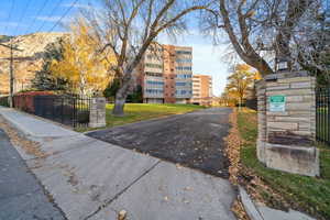 Exterior space featuring a lawn and a mountain view