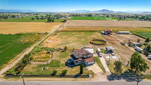 Drone / aerial view with a mountain view and a rural view