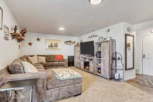 Living room with hardwood / wood-style floors