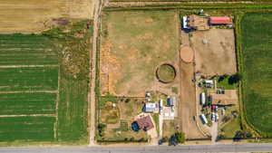 Birds eye view of property with a rural view