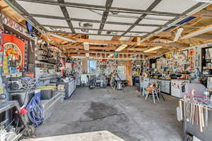 Garage featuring a workshop area