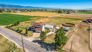 Birds eye view of property featuring a mountain view and a rural view