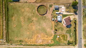 Birds eye view of property featuring a rural view