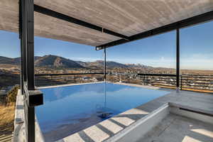 View of rooftop swimming pool/spa.