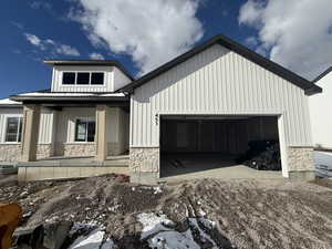 View of front of house with a garage