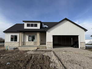 View of front of house with a garage