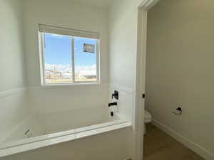 Master Bathtub with toilet room