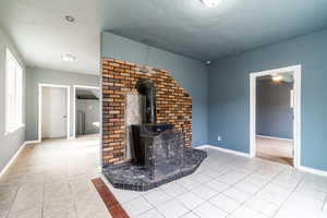 wood burning stove in this cozy front room