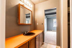 vanity and sink for main floor bedroom