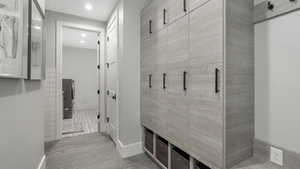 Mudroom with tile floors