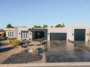 View of front of home featuring a garage