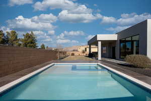 View of pool with a patio area