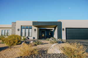 Modern home featuring a garage