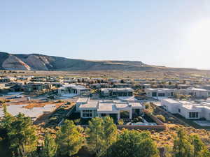 Birds eye view of property with a mountain view