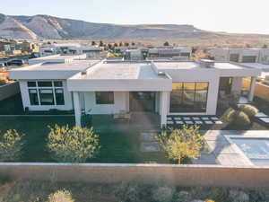 Rear view of property featuring a mountain view