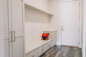 Mudroom with light wood-type flooring